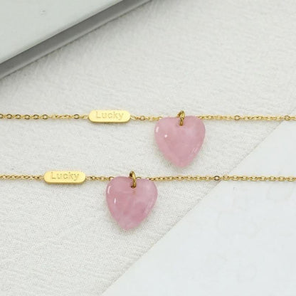 Colgante de corazon de melocontón de cuarzo