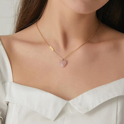 Colgante de corazon de melocontón de cuarzo